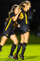 The women's soccer team (including Jenny Cape, right, from the Cy-Hawk game last season) was originally scheduled to be the earliest-starting athletics program for Iowa this fall. The wait continues to see what the fall campaign actually holds for college sports.