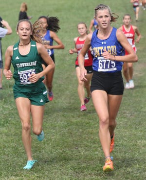 Ontario freshman Brienne Trumpower took Ashland Cross Country Invite meet champion honors in the Division II/III race with a time of 19:19.1 for her first career victory and leading the Lady Warriors to the team championship.