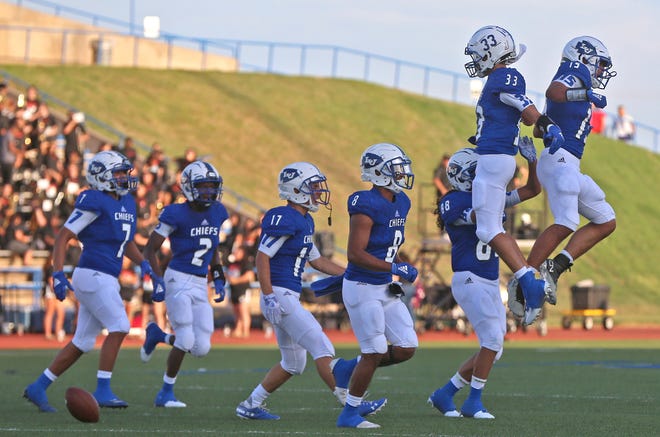 Players for Lake View celebrate after a play during the first game of the season Friday, August 30, 2019.