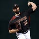 Aug 31, 2019; Phoenix, AZ, USA; Arizona Diamondbacks starting pitcher Robbie Ray (38) pitches against the Los Angeles Dodgers during the first inning at Chase Field. Mandatory Credit: Joe Camporeale-USA TODAY Sports