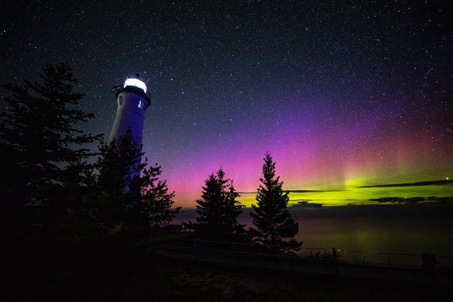 The northern lights viewed from Crisp Point Lighthouse in Newberry on Saturday, Aug. 31, 2019.
