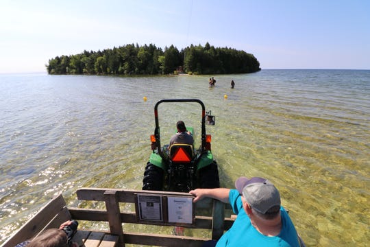 To Get To Door County S Cana Island Lighthouse You Ll Have To
