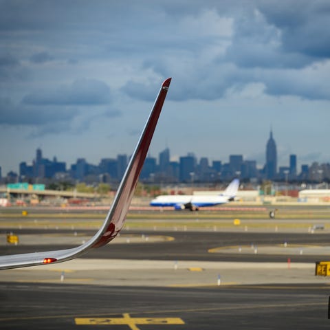 An Alaska Airlines employee hit an alarm at Newark