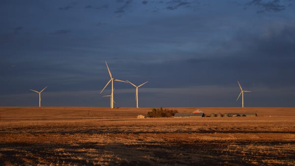 A wind turbine installation owned by NextEra Energ
