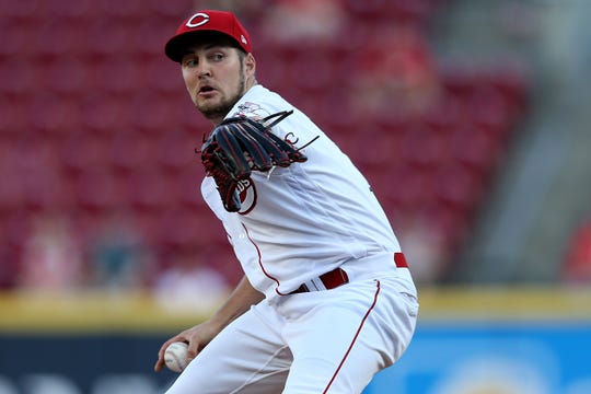 Cincinnati Reds starting pitcher Trevor Bauer (27) delivers in the first inning of an MLB baseball game against the Philadelphia Phillies, Wednesday, Sept. 4, 2019, at Great American Ball Park in Cincinnati. 