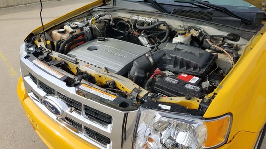 The 2012 Ford Escape Hybrid NYC Taxi mated a 2.5-liter gas engine to a nickel-metal hydride battery and electric motor.
