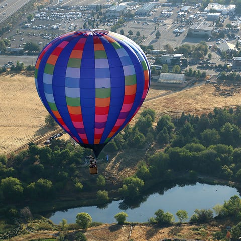 A hot air balloon is seen flying over Rancho San R