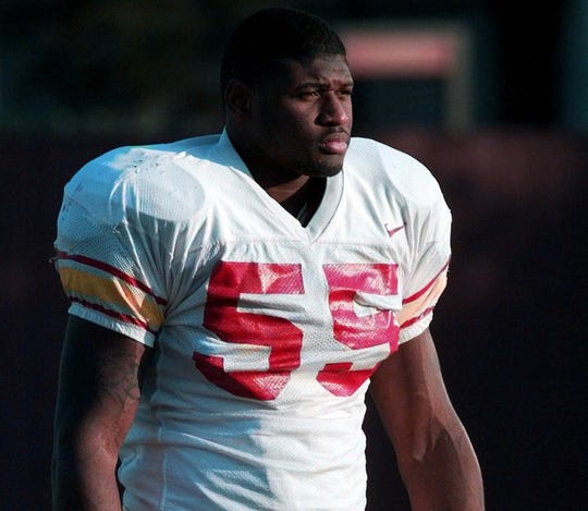 Chris Claiborne played linebacker at Southern California from before his NFL career and move to becoming a high school coach.