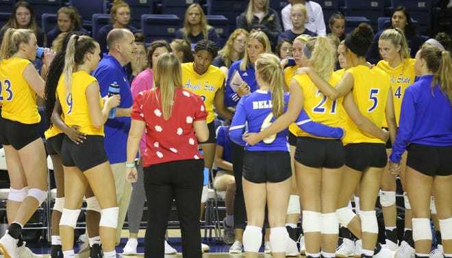 Head coach Chuck Waddington and the Angelo State University volleyball team talk things over during a match against Southeastern Oklahoma at the Kathleen Brasfield ASU Invitational Friday, Sept. 6, 2019.