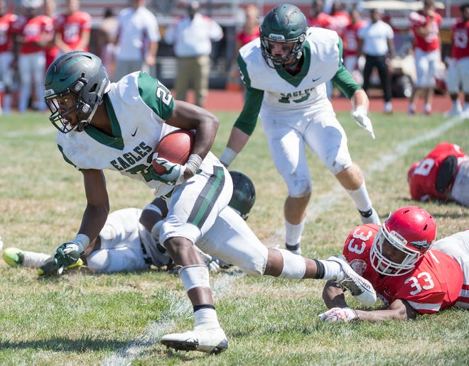 West Deptford's Kameron Dixon runs the ball after making an interception during the 3rd quarter of the football game between West Deptford and Paulsboro, played at Paulsboro High School on Saturday, September 7, 2019.  West Deptford defeated Paulsboro, 31-14.
