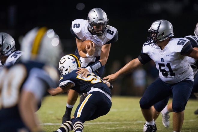 Reitz's Reid Brickey (2) is tackled during the Castle Knights vs Reitz Panthers game at John Lidy Field Friday evening, Sept. 6, 2019. 
