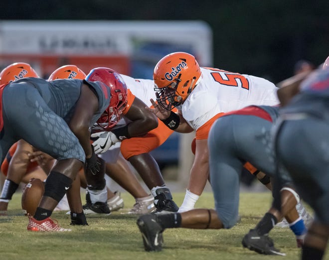 Brennan Smith (50) gets set for the snap during the Escambia vs Pine Forest football at Pine Forest High School in Pensacola on Friday, September 6, 2019.