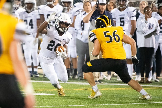 Keyshawn Jones (28) jukes the defender during the football game between Red Lion and Chambersburg at Red Lion Area High School, Saturday, September 6, 2019. The Lions defeated the Trojans 26-21.