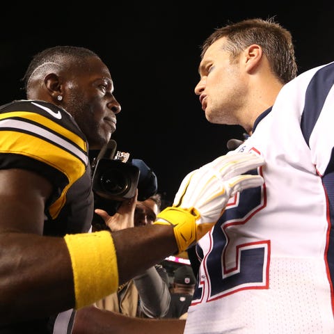 Antonio Brown and Tom Brady talk after a 2016 game