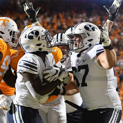 BYU Cougars running back Ty'Son Williams celebrate