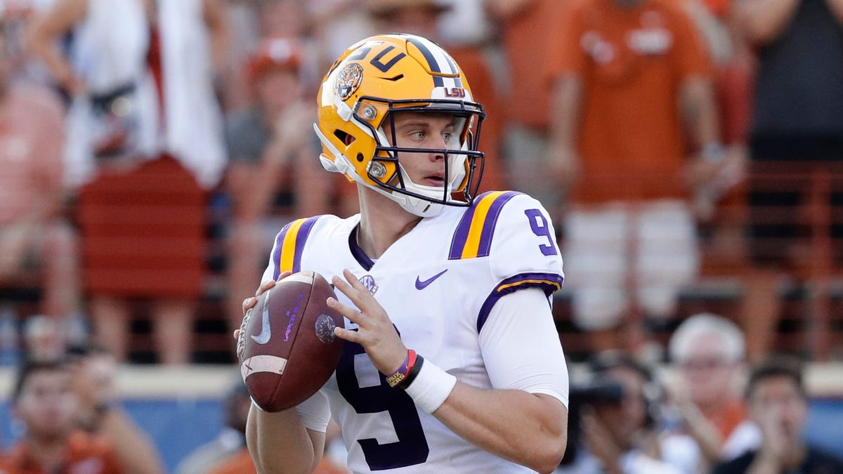LSU quarterback Joe Burrow threw for 471 yards, with four touchdowns, to propel the Tigers to a 45-38 victory against Texas.
