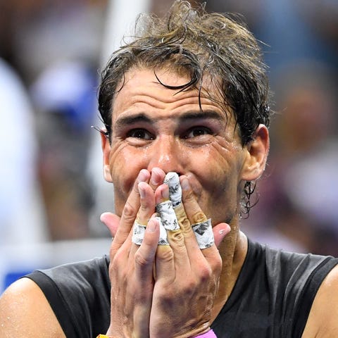 Rafael Nadal reacts after winning his fourth US Op