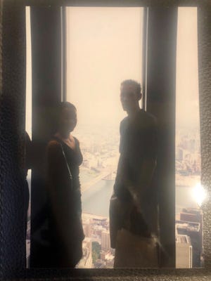 Annabelle Tometich, left, and her now-husband, Buddy Martin, at the top of 1 World Trade Center in August 2001.
