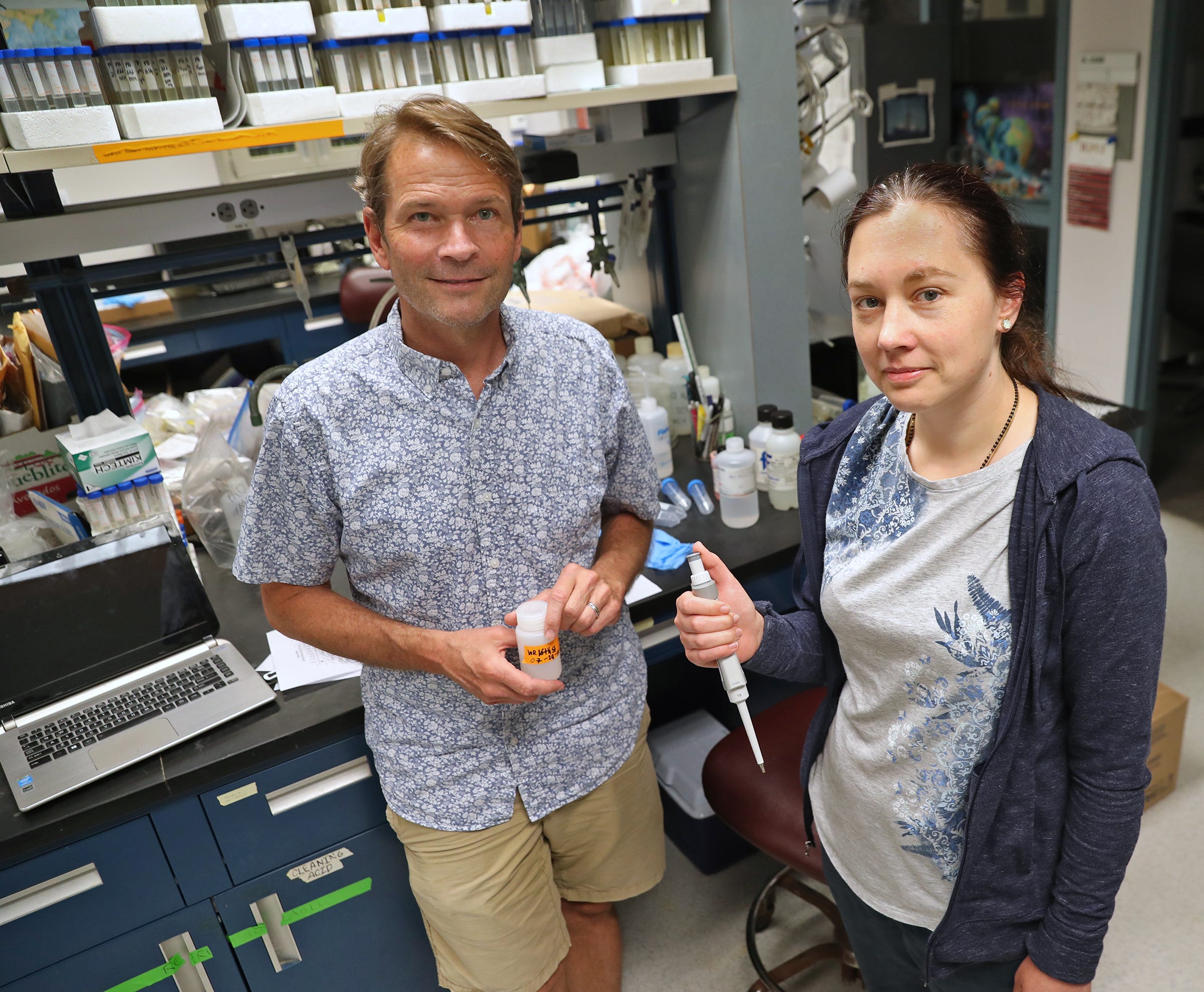 Gabe Filippelli, left, and Katerina Mazari stand in their lab at IUPUI on Aug. 5, 2019.  IUPUI researchers completed a monthlong test of the White River.