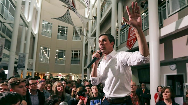 In this March 19, 2019, file photo, Democratic presidential candidate Beto O'Rourke gestures during a campaign stop at Keene State College in Keene, New Hampshire. After a mass shooting in his hometown of El Paso, the Democrat has again remade his White House bid.
