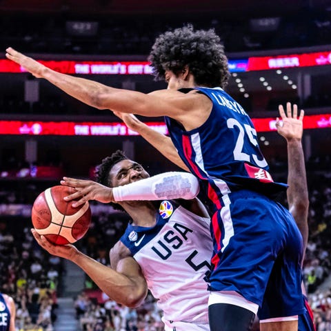 Team USA's in action against France's Louis Labeyr