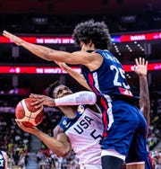 Team USA's in action against France's Louis Labeyrie during the FIBA World Cup quarterfinals.