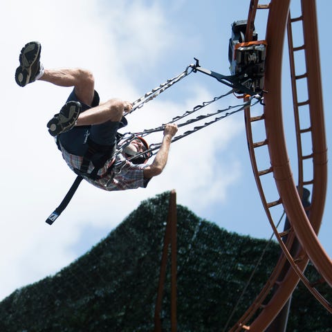 Jeff Hazard of Wears Valley rides the new zipline 