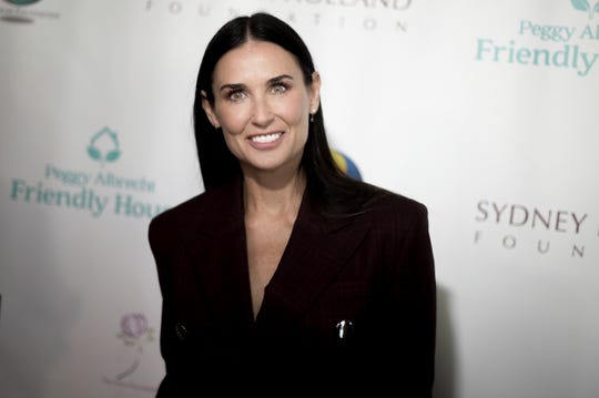 Demi Moore poses naked for stunning Harpers Bazaar cover 