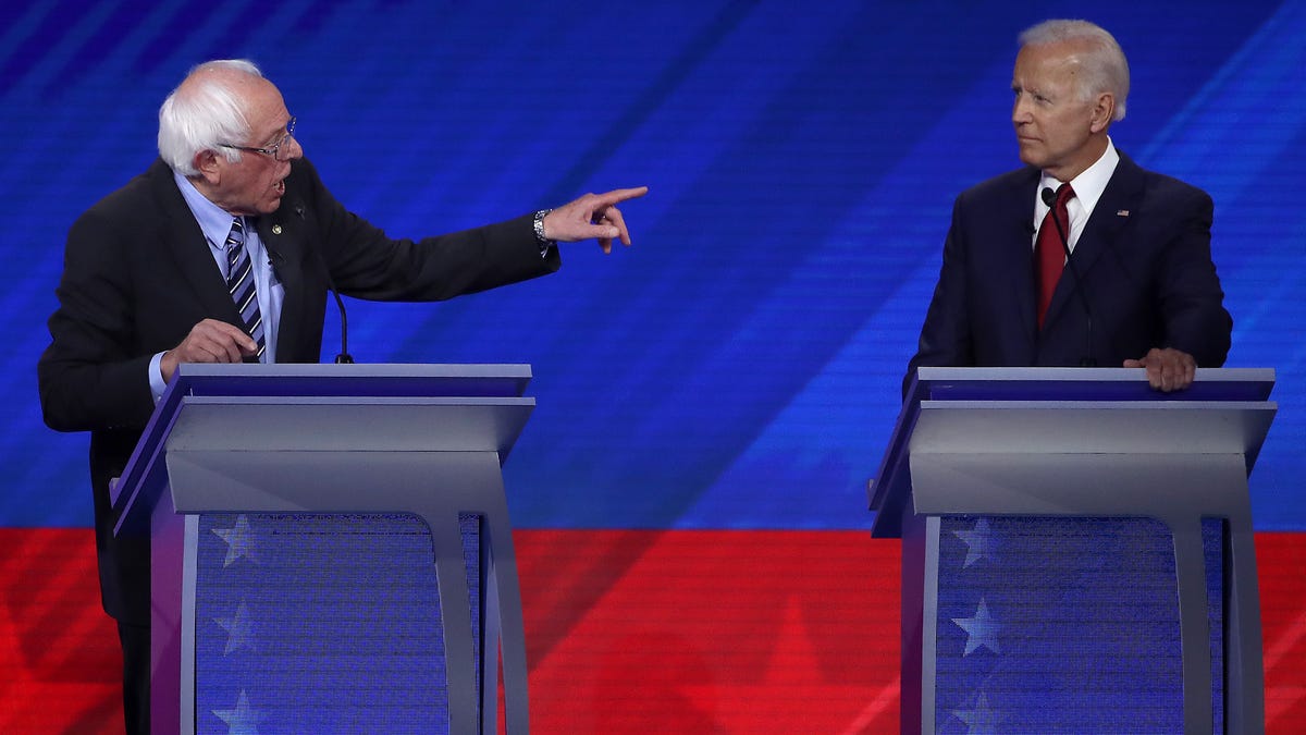Democratic presidential candidates Sen. Bernie Sanders (I-VT) and former Vice President Joe Biden interact during the Democratic Presidential Debate at Texas Southern University's Health and PE Center on Sept. 12, 2019 in Houston, Texas.