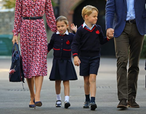 Britain's Princess Charlotte of Cambridge, with her brother, Britain's Prince George of Cambridge, arrives for her first day of school at Thomas's Battersea in London on Sept. 5, 2019.