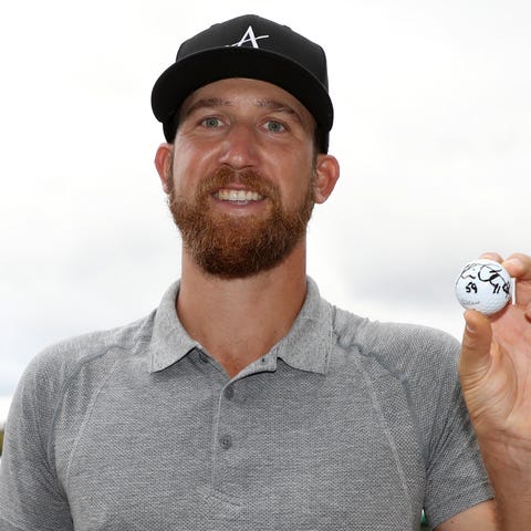 Kevin Chappell celebrates his record-tying 59.