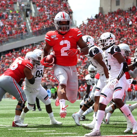 Ohio State running back J.K. Dobbins breaks throug