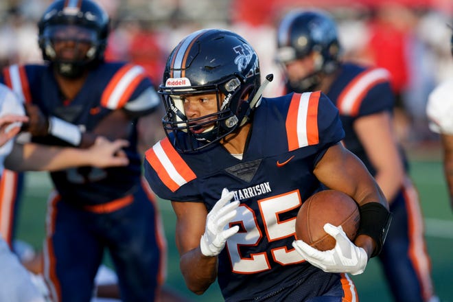 Harrison running back Marcel Atisso (25) runs the ball during the first quarter of an IHSAA football game, Friday, Sept. 13, 2019 in West Lafayette. Lafayette Jeff won, 47-35.