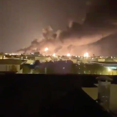 Smoke fills the sky at the Abqaiq oil processing f