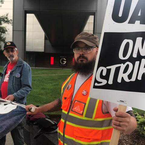 From left, Frank Hammer, retired UAW/GM internatio