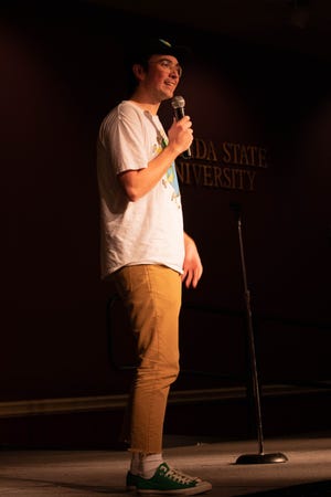 Mitch Phillips shares his routine with the audience at Club Downunder's Open Mic Night on Thursday, September 12.