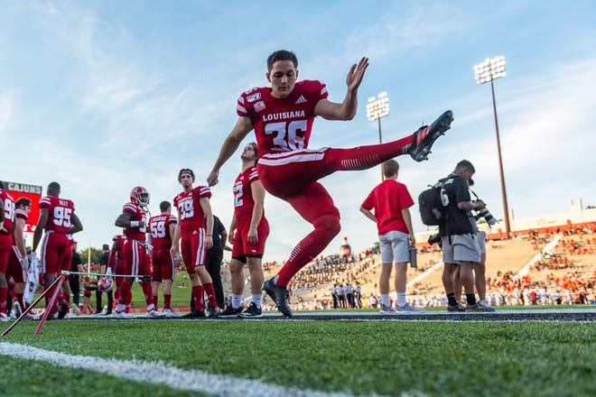 UL kicker Stevie Artigue practices on the sidelines as the Ragin' Cajuns take on Texas Southern Sept. 14.