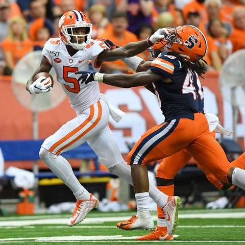 Clemson wide receiver Tee Higgins (5) grabs the fa