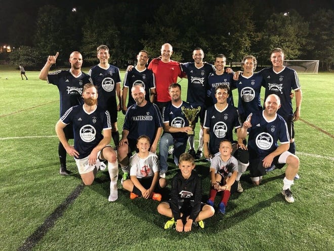 Watershed Pisgah Brewing Co. brings home its second cup of the summer season in the ABASA Over 40 1st Division. Back row, left to right: Joel Lenk, TJ Toothman, Clay Heck, Thorsten Path, Bill Alexander, Todd Wilkinson, Matt Schwarz and Walker Ferguson. Front row, left to right: Tripp Kinnard, JP Kennedy, Page Campbell, Andrew Bednarzik and Ryan King.