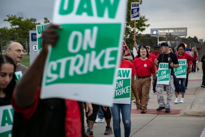 UAW strikers with Local 22 take to the streets outside of GM Detroit-Hamtramck Assembly Monday, Sept. 16, 2019.