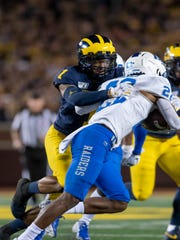 Michigan defensive back Ambry Thomas worked his way back from a bout with colitis in time to play in the season opener against Middle Tennessee State.