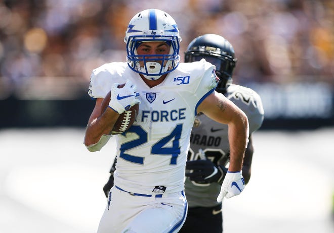 Air Force running back Kadin Remsberg runs for a touchdown on the first play over overtime Saturday, Sept. 14, 2019, to give the Falcons a 30-23 win at Colorado. The win was Air Force's first against CU since 1968.