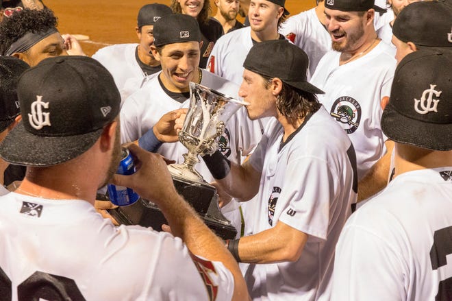 Jackson Generals players continued the tradition of drinking from the cup of the championship trophy after their win on Sunday night.