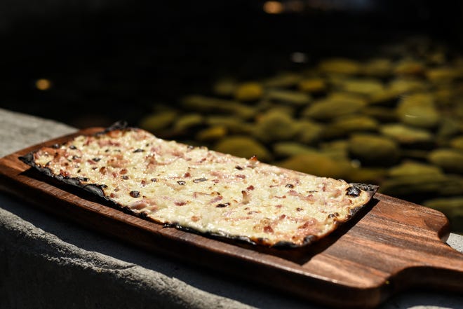 Tarte flambée with fromage blanc and bacon at Faubourg in Montclair.