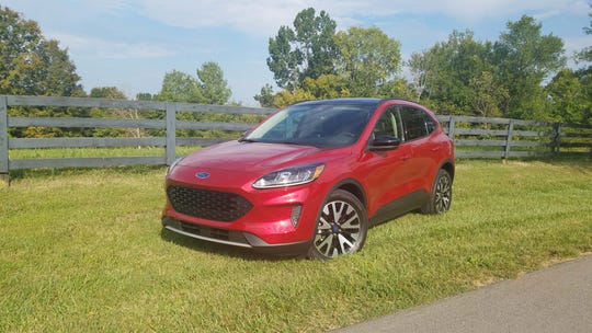 The 2020 Ford Escape Sport Hybrid comes with blacked-out grille and windows, a digital instrument cluster and 198 horsepower.