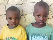 Betsy and Shawn Wright saw this picture of Wenkers and Gregory and decided to adopt them from Haiti