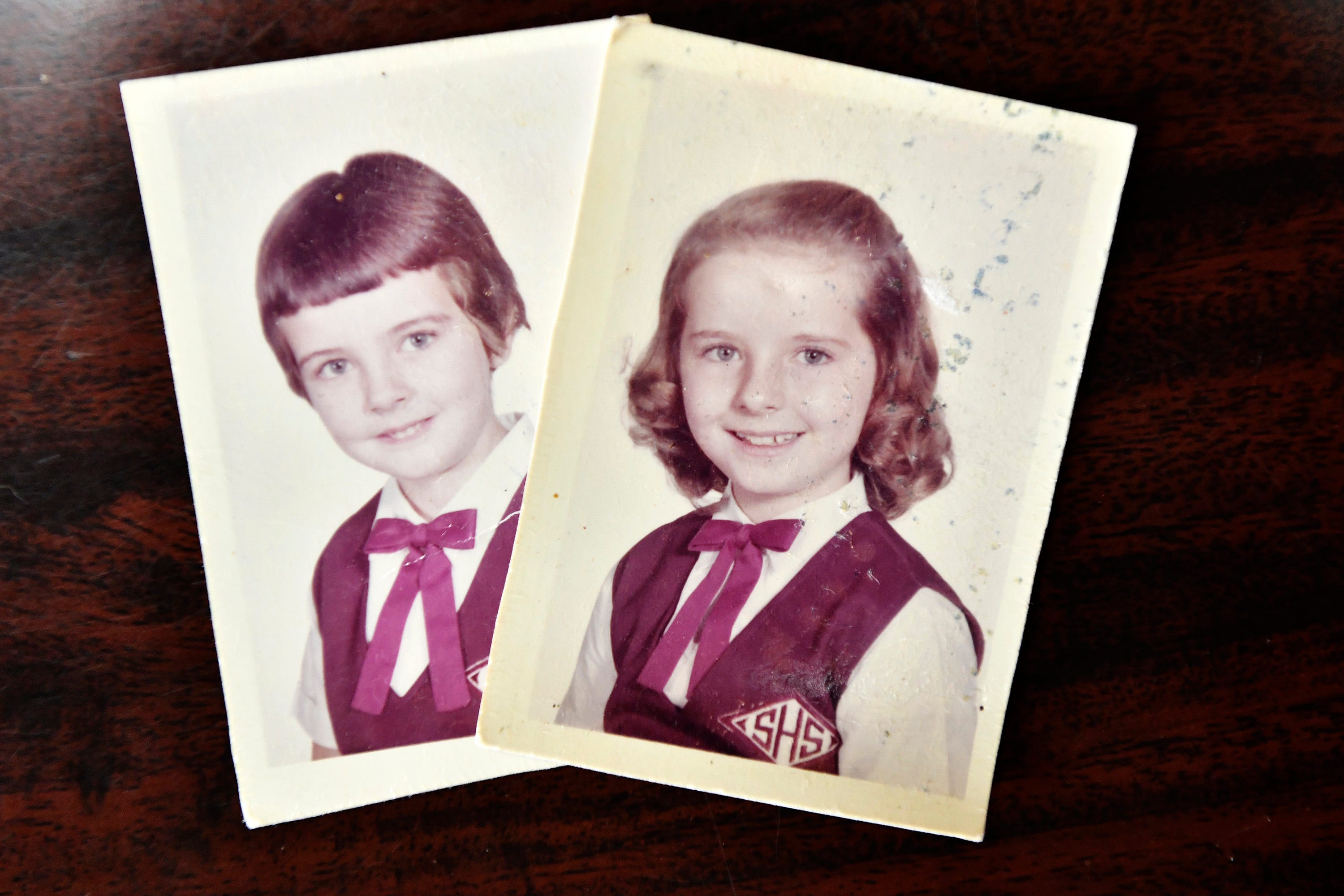 Ann Hagan Webb in 3rd grade, right,  and her sister Carol Hagan McEnteee in first grade in 1960. Webb did not remember being the victim of abuse as a child attending Sacred Heart elementary school in West Warwick, Rhode Island until she was 40. Her sister Carol Hagan McEntee, left, a member of the Rhode Island House of Representatives, introduced legislation to amend the state's civil statute of limitations for childhood sexual abuse. McEntee named her legislation "Annie's Bill" in honor of her sister.