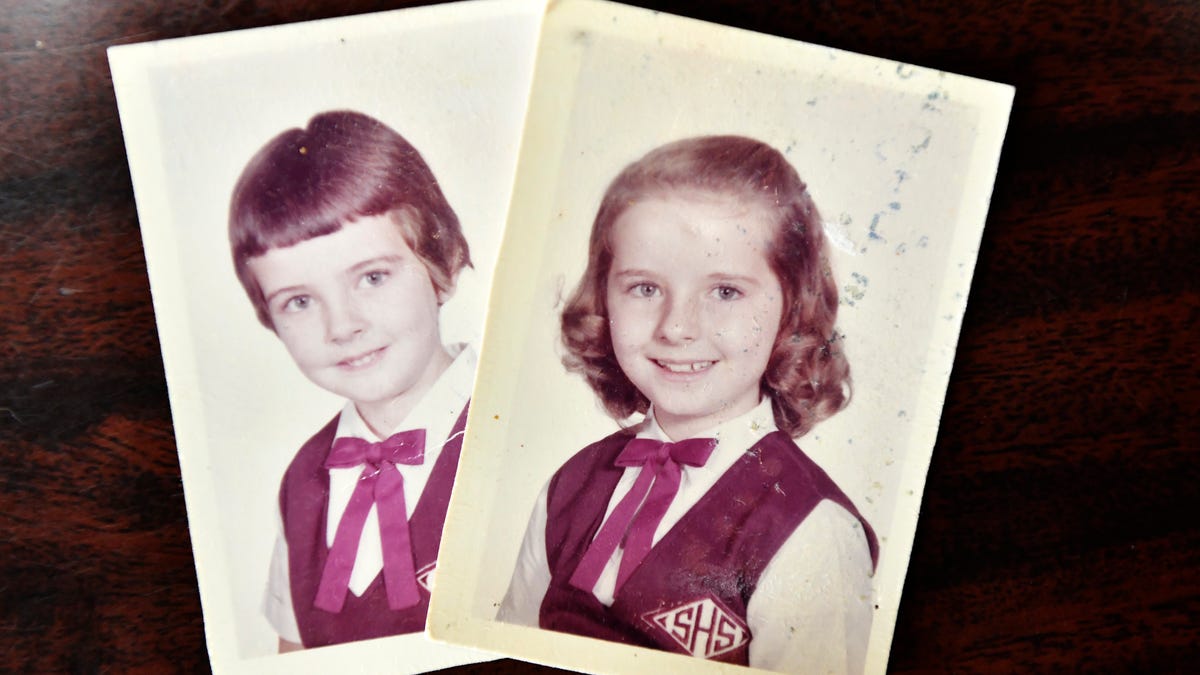 Ann Hagan Webb in 3rd grade, right,  and her sister Carol Hagan McEnteee in first grade in 1960. Webb did not remember being the victim of abuse as a child attending Sacred Heart elementary school in West Warwick, Rhode Island until she was 40. Her sister Carol Hagan McEntee, left, a member of the Rhode Island House of Representatives, introduced legislation to amend the state's civil statute of limitations for childhood sexual abuse. McEntee   named her legislation "Annie's Bill" in honor of her sister.