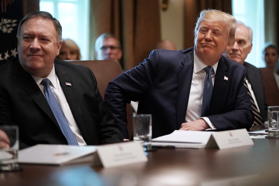 WASHINGTON, DC - JULY 16: U.S. President Donald Trump listens to a presentation about prescription drugs during a cabinet meeting with Secretary of State Mike Pompeo (L), acting Defense Secretary Richard Spencer and others at the White House July 16, 2019 in Washington, DC. Trump and members of his administration addressed a wide variety of subjects, including Iran, opportunity zones, drug prices, HIV/AIDS, immigration and other subjects for more than an hour. (Photo by Chip Somodevilla/Getty Images) ORG   XMIT: 775374453 ORIG FILE ID: 1162404480
