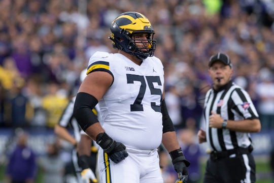 Michigan offensive lineman Jon Runyan            will make his season debut Saturday at Wisconsin.